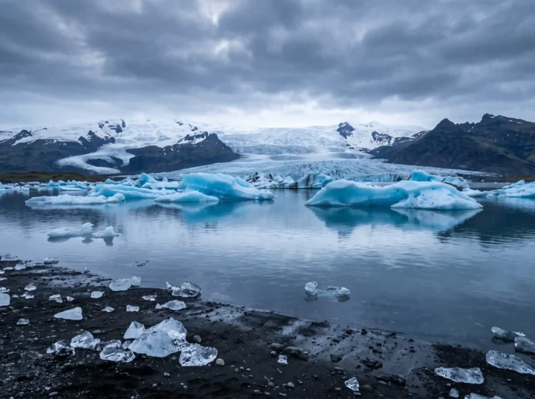 Glowing blue icebergs float silently
